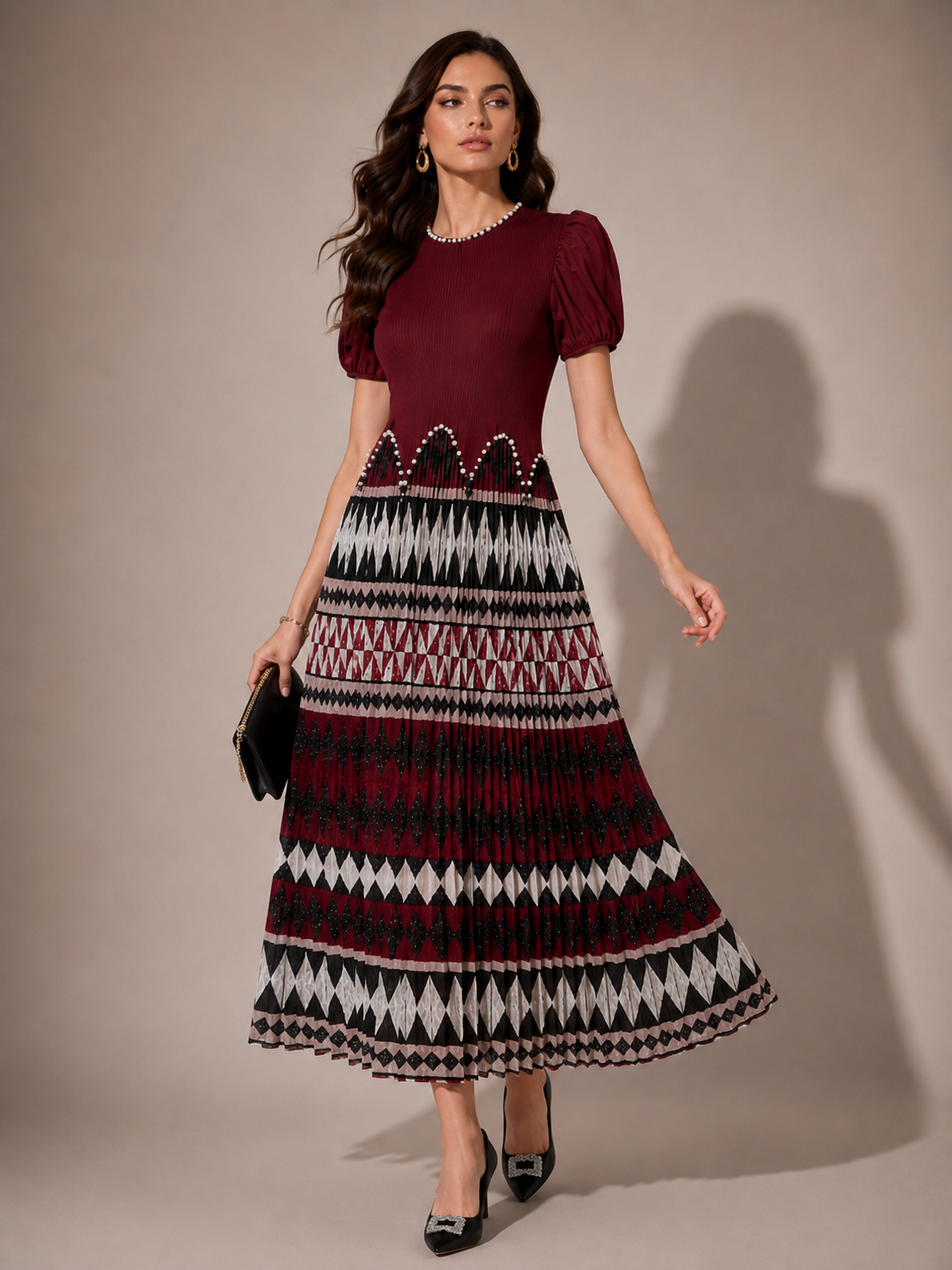 Maroon midi dress with patterned band print, short puff sleeves and beaded waist
