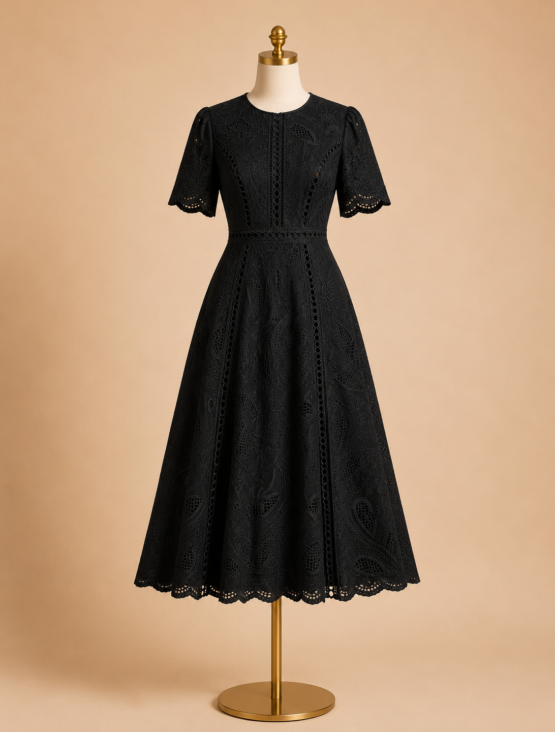Black lace midi dress with short sleeves, fitted waist, flared skirt on mannequin