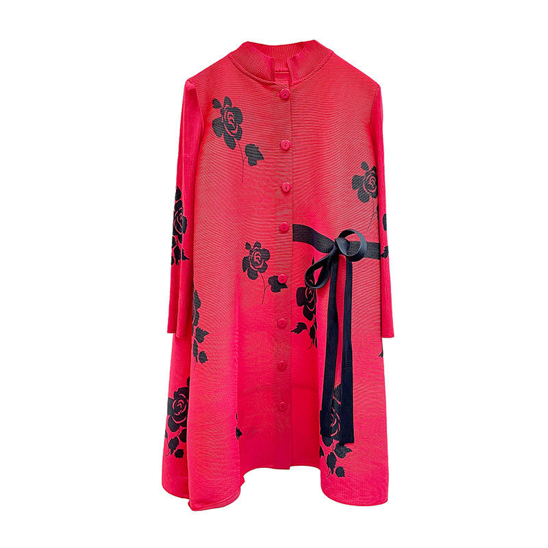 Red button-front dress with black floral print and tied waist ribbon