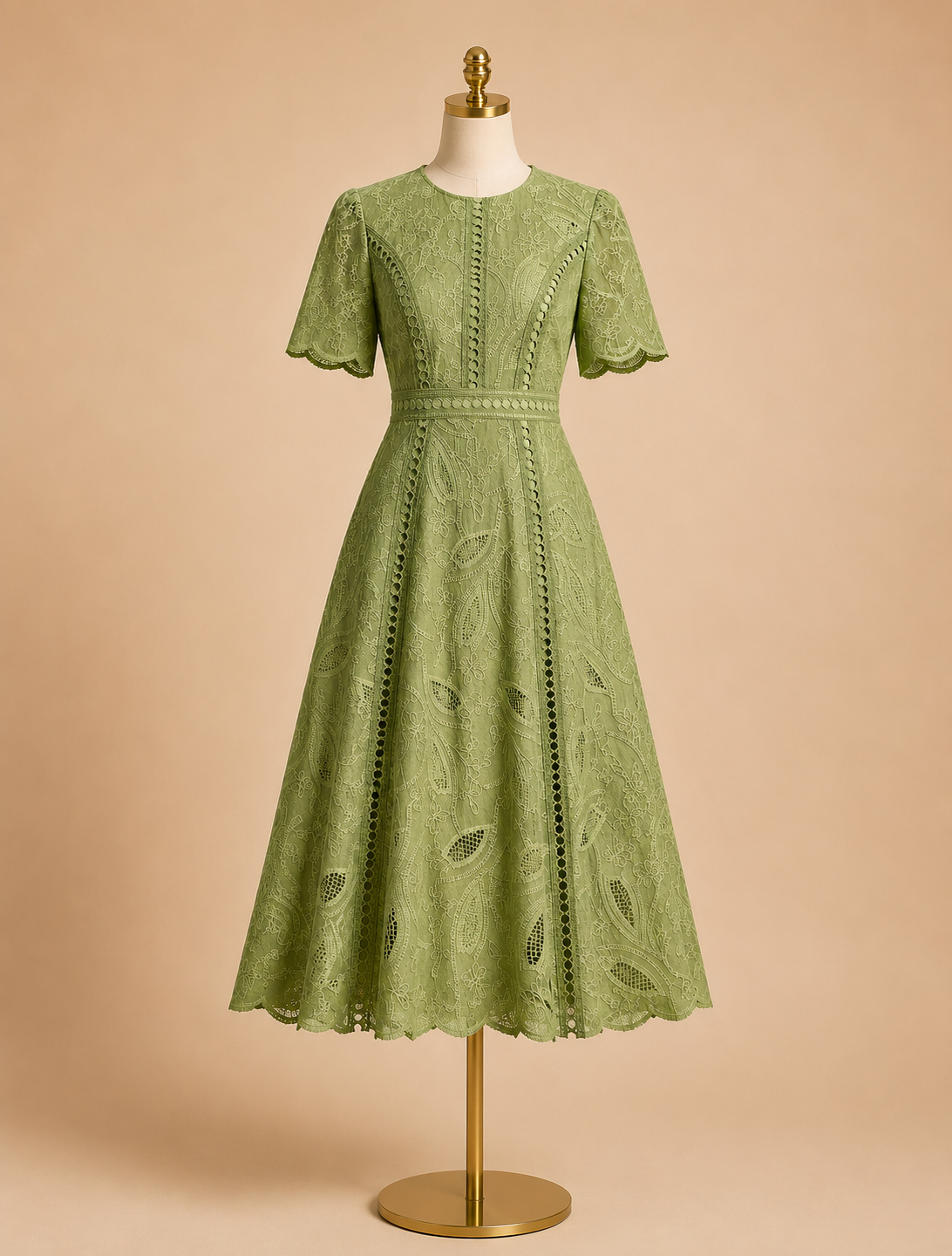 Green lace midi dress with short sleeves, fitted waist, flared skirt on mannequin